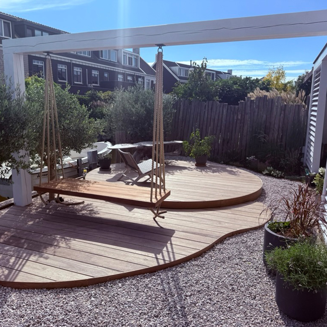 Custom outdoor living space with curved wooden deck